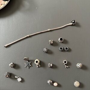 Pandora Bracelet w/14 charms worn about 3 times-dangling snowflake not included
